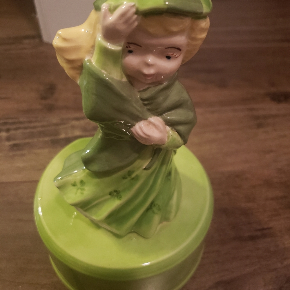 Vintage music box, girl in green dress